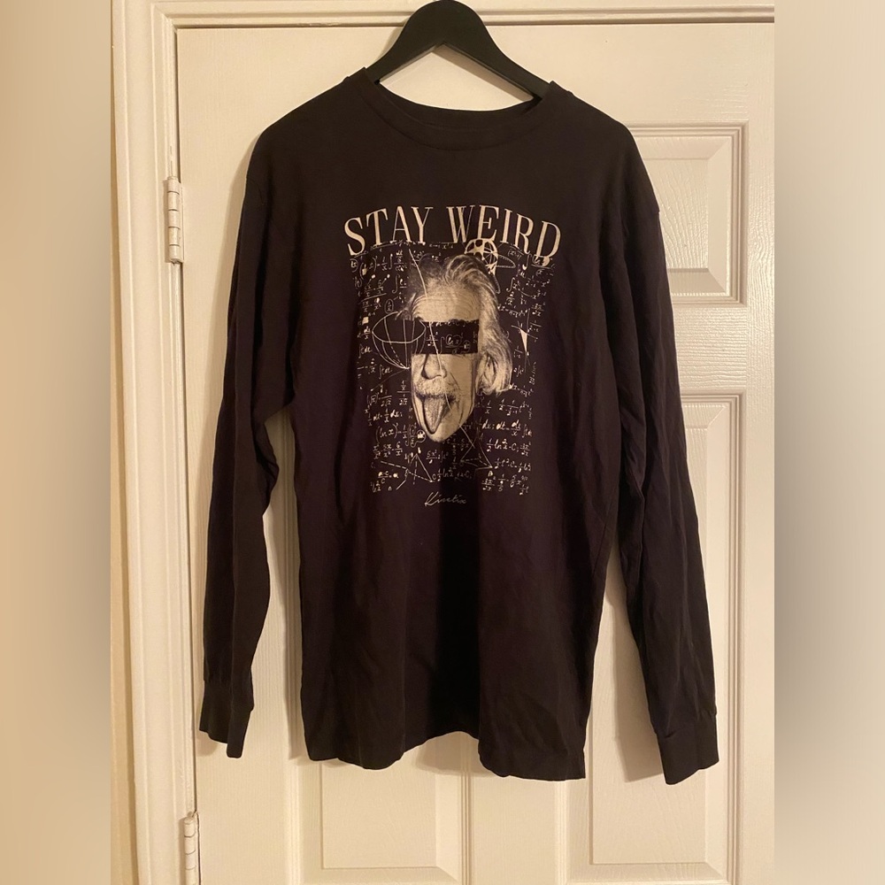 Kinetix Casual Luxury Los Angeles Men’s Black “Stay Weird” Long Sleeve T-shirt.